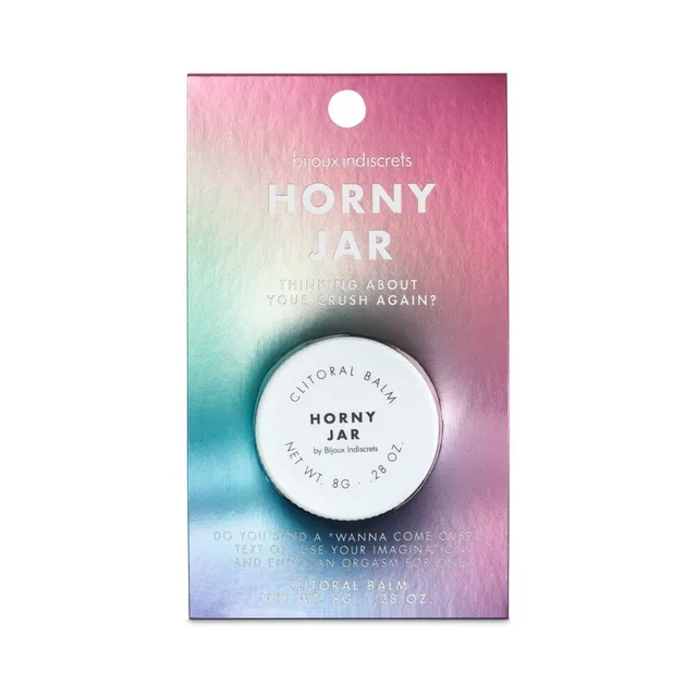 small Horny Jar clitoral balm container mounted on a pink blue gradient retail card