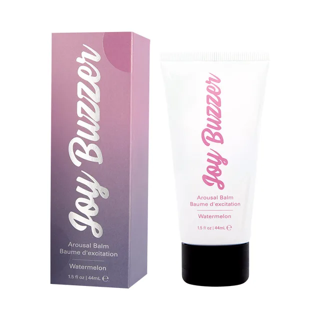 Jelique Joy Buzzer Watermelon balm tube beside tall pink carton