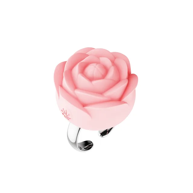 Angled view of pink Fiore sculpted rose and silver ring band