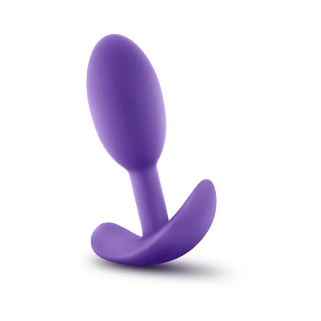 Blush Luxe Vibra Slim purple plug upright front view with oval body and curved wing base