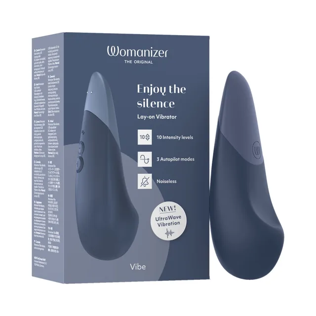 dark blue Womanizer Vibe vibrator standing beside matching retail box