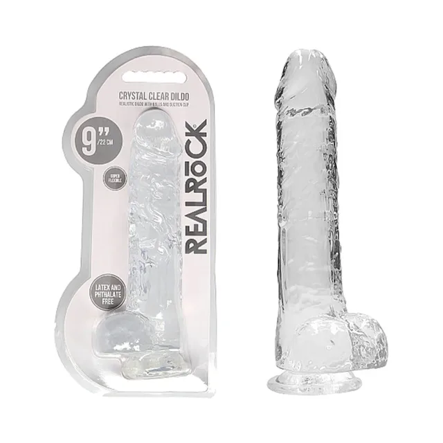 Clear RealRock Crystal Clear 9-inch dildo beside retail pack