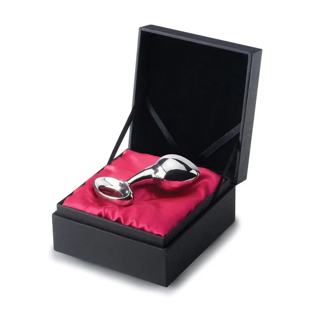 large polished Njoy Pure Plug with ring handle inside a black satin-lined box