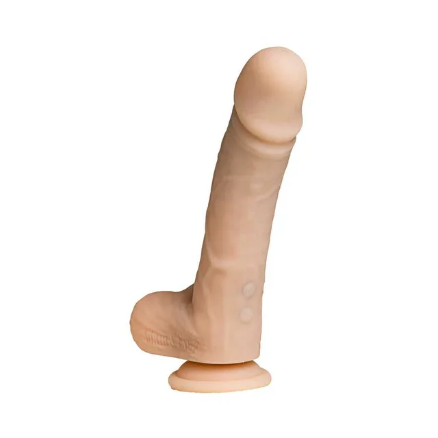 Front upright view of beige Money Shot dildo on suction base