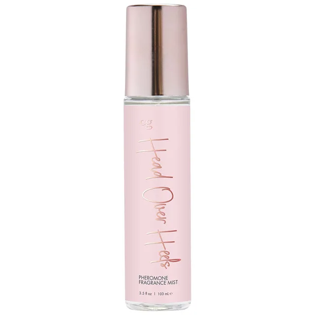 Head Over Heels 3.5 oz body mist clear cylindrical bottle with pale-pink liquid and rose-gold cap