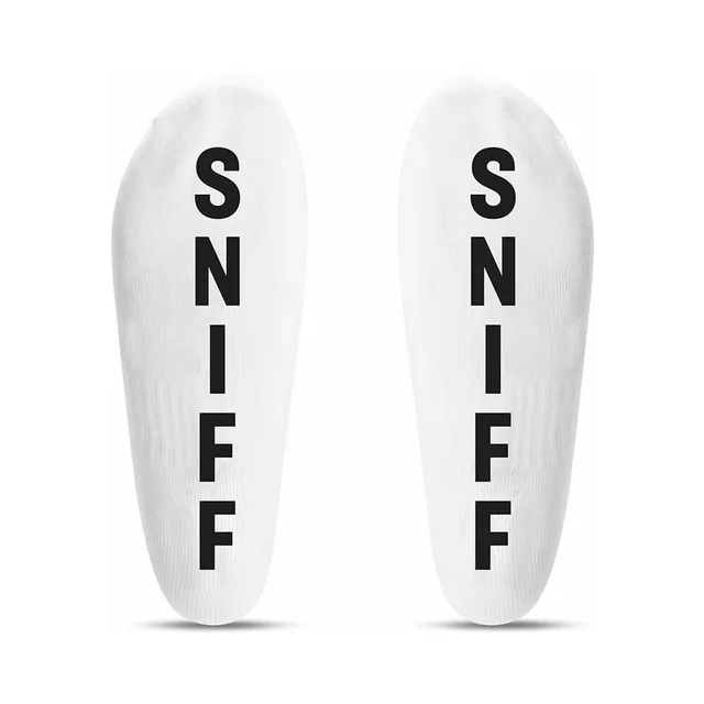 Soles of white Prowler RED ankle socks with vertical SNIFF text