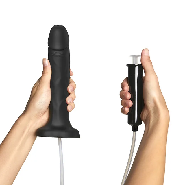 Strap-On-Me large black realistic dildo with pump held with separate squeeze pump