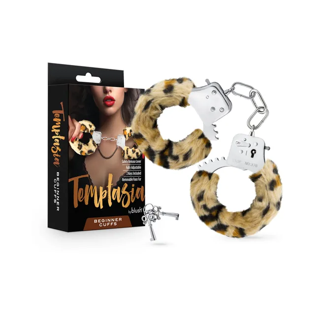 Blush Temptasia leopard beginner handcuffs beside black Temptasia retail box with keys and chain
