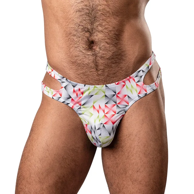 Male Power Cut It Out S/M multicolor geometric cutout thong front view worn by model
