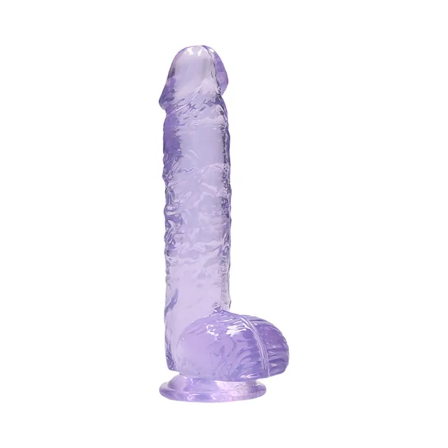 Front view of translucent purple dildo with balls and suction base