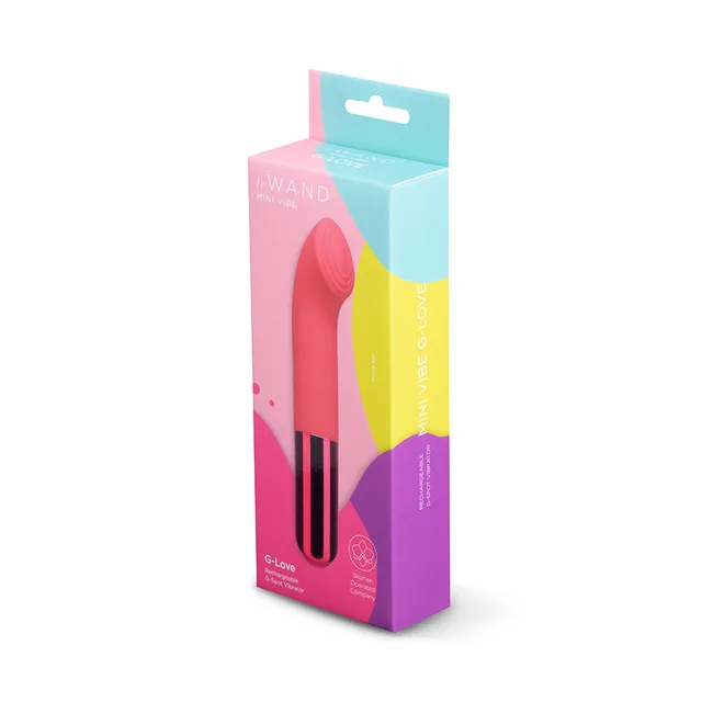 Hot pink Le Wand G-Love beside pink-and-teal retail box