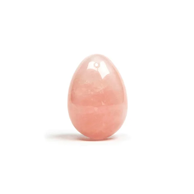 Upright view of light-pink Chakrubs Heart drilled rose quartz yoni egg