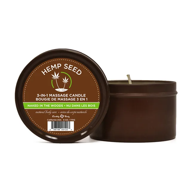 Open brown Earthly Body massage candle tin with labeled lid