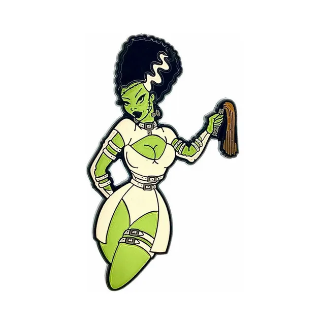 Miss Frank enamel pin with green figure, tall black hair and white outfit