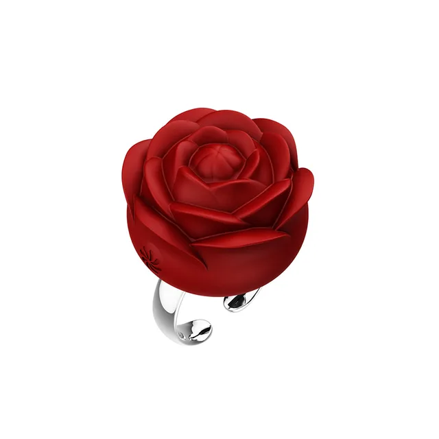 Angled view of deep-red Fiore rose and silver ring band