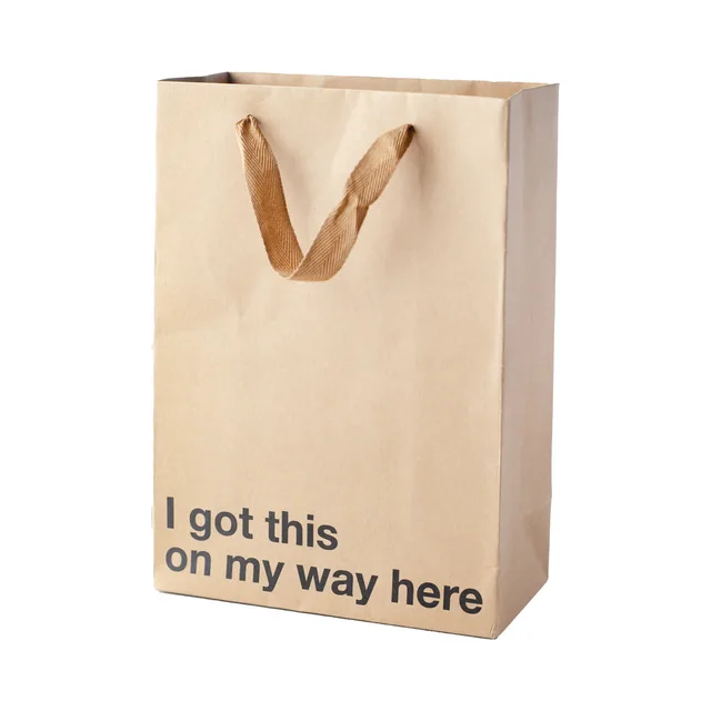 tan kraft gift bag reading I got this on my way here