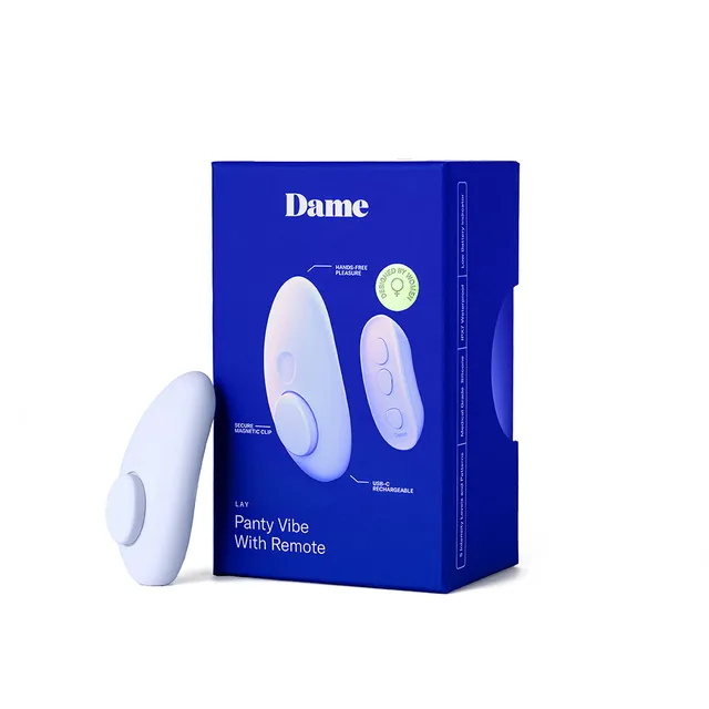 Dame Lay pale lavender panty vibrator beside blue retail box and flat remote
