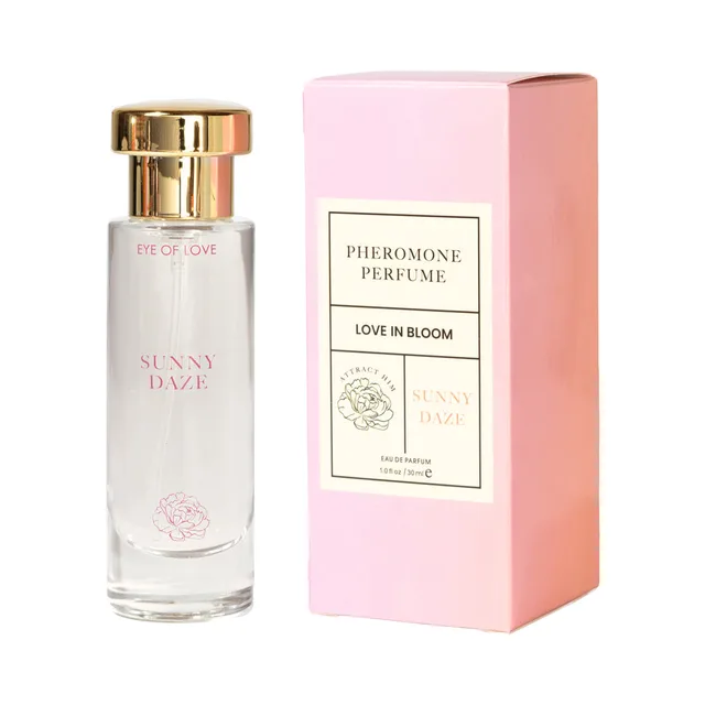 Sunny Daze 1 oz parfum bottle beside its tall light pink Eye of Love Bloom box
