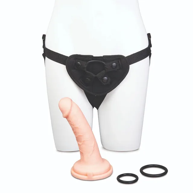 Black harness, vanilla dildo and three rings on mannequin