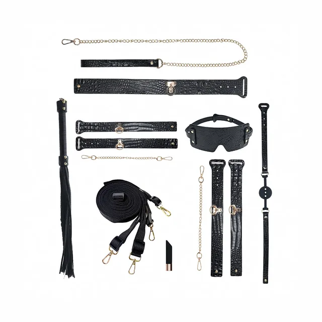 black croc-print Rome restraint pieces chains straps and flogger arranged together