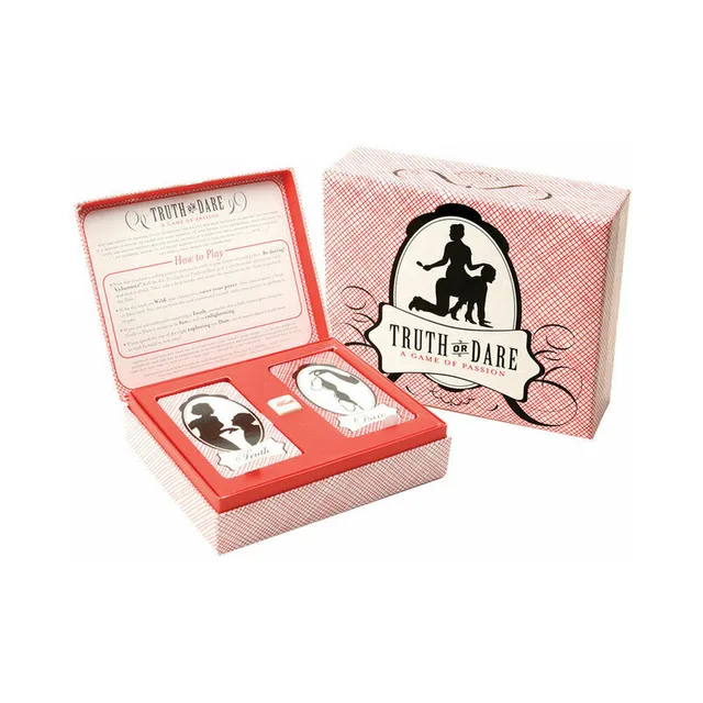 open pink Truth or Dare Game of Passion box with cards and die