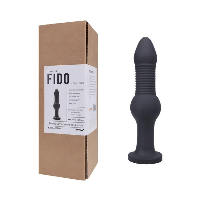 Black Tantus Fido dildo beside labeled brown retail box