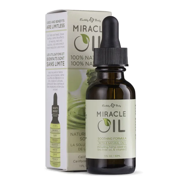 Earthly Body Miracle Oil amber dropper bottle beside green and white carton