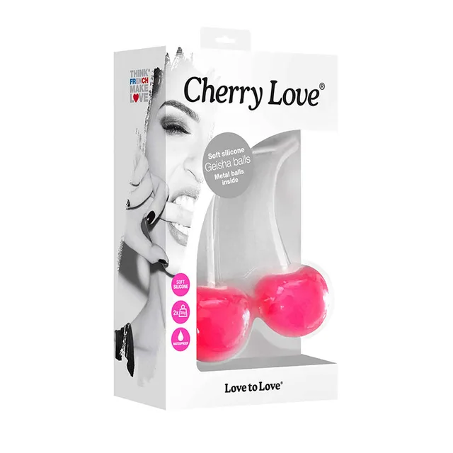 Pink Cherry Love dual silicone Kegel balls displayed beside white carton