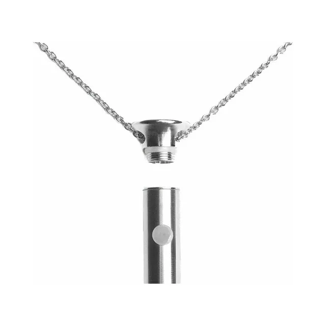 Crave Vesper pendant opened beneath its silver chain to reveal the charging connection