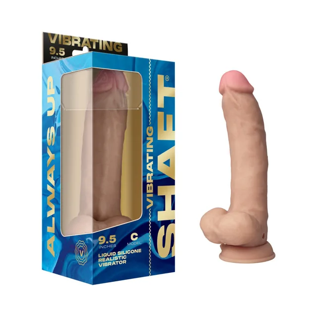 Shaft Model C pine silicone vibrator beside blue windowed retail box