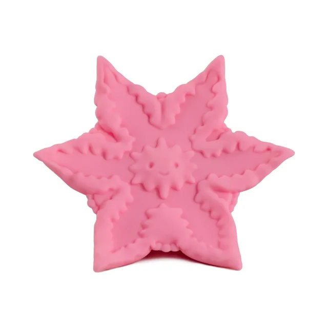 light-pink Starsi vibrator with raised textures across six points