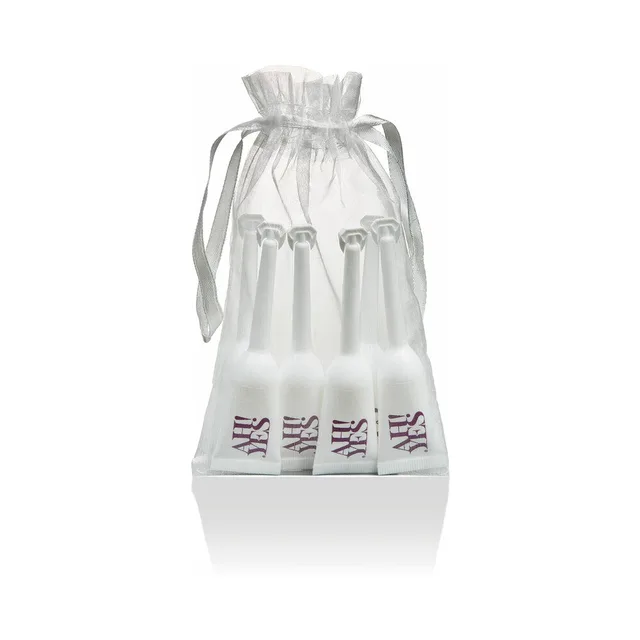 six AH YES VM applicators arranged in white drawstring pouch