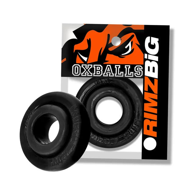 Black Oxballs Rimz Big wide-profile ring in front of package