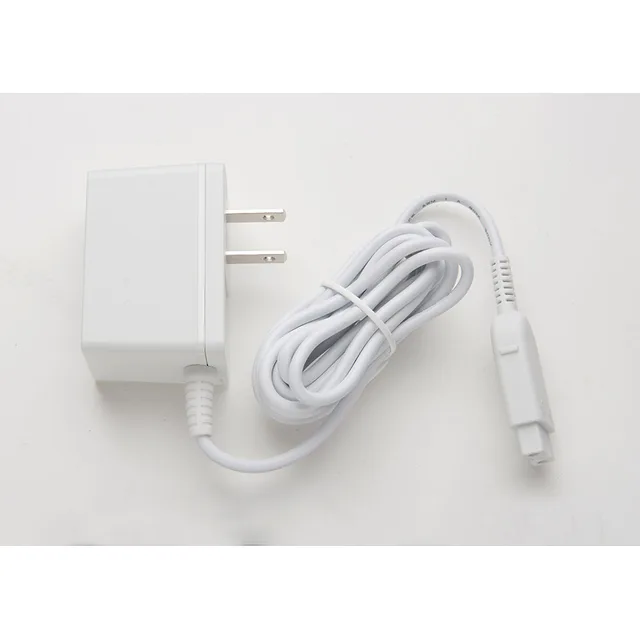 White HV-360 wall adapter beside coiled cable and two-contact plug
