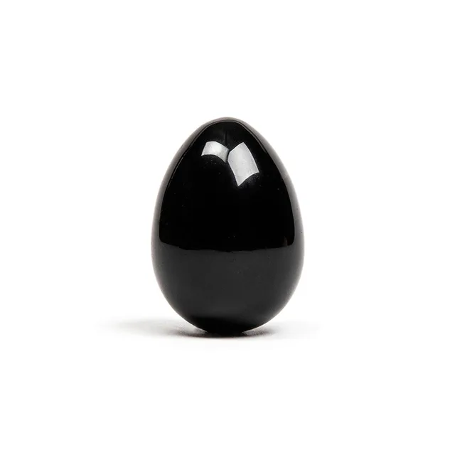 Upright view of black Chakrubs Xaga non-drilled obsidian yoni egg