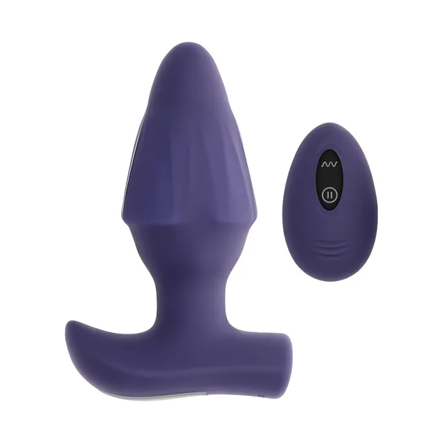 Evolved Starburst purple expandable anal plug front view beside the matching purple oval remote