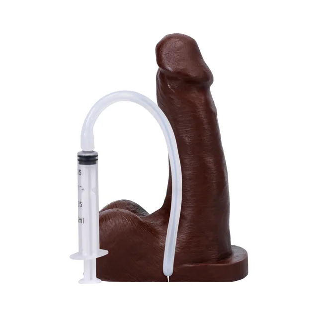 Espresso POP n Play packer beside connected syringe