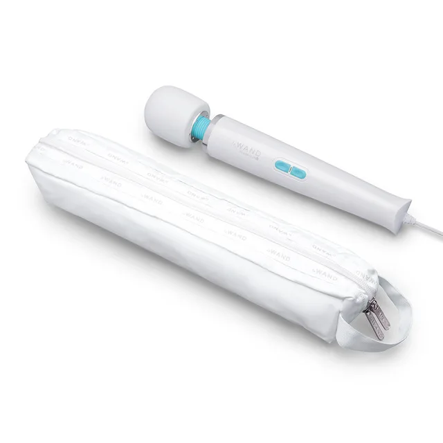 White Le Wand Classique Plug-In beside white storage pouch