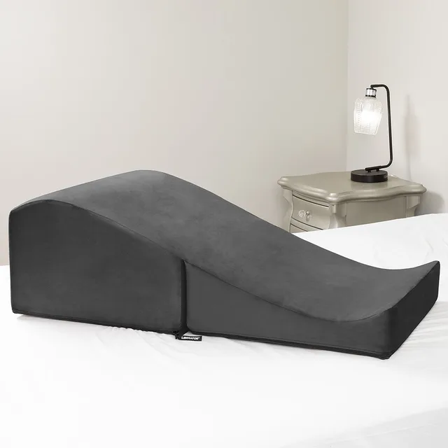 Liberator Flip Ramp extended on bed with curved upper surface