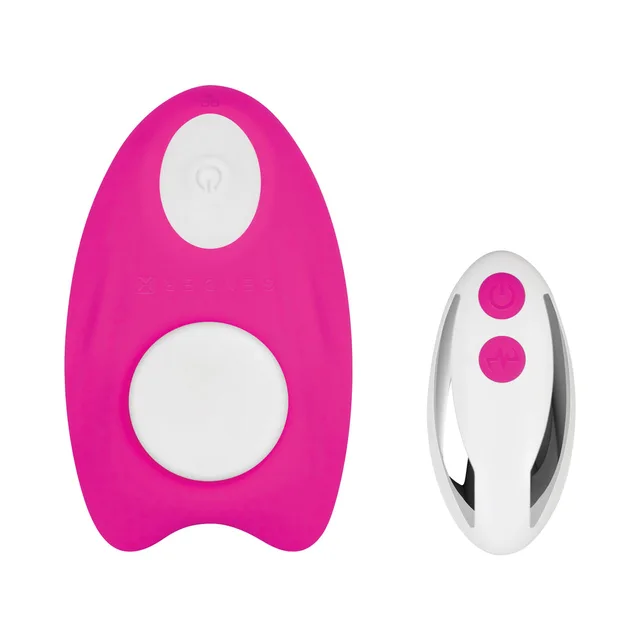 Front view of pink wearable vibrator beside white oval remote