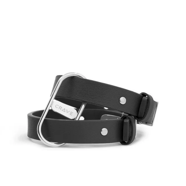 Crave ICON black leather cuffs stacked with silver-tone hardware