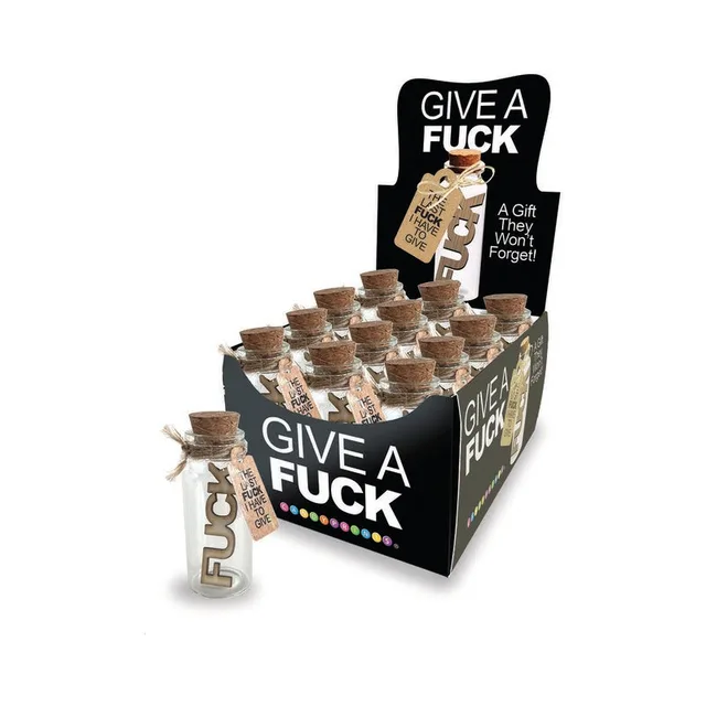 black countertop display holding twelve corked Last Fuck glass novelty jars