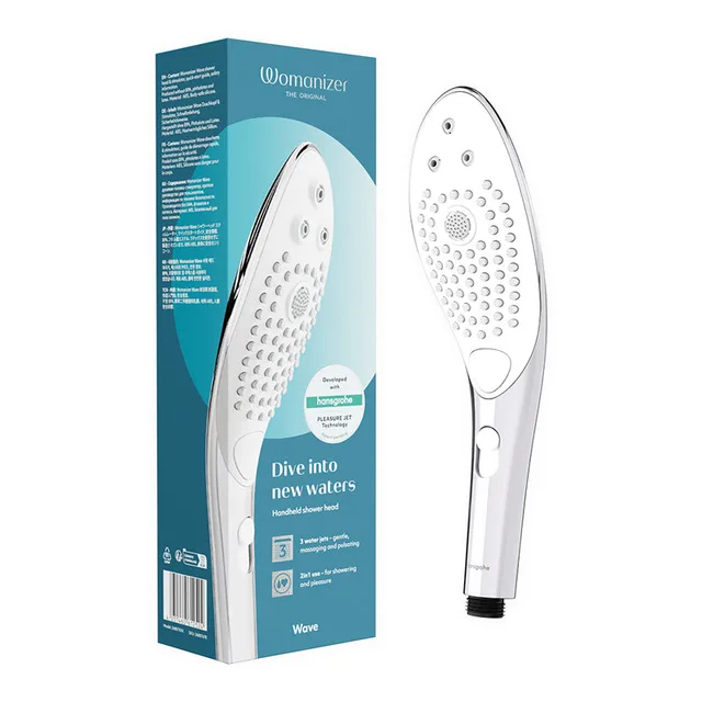 chrome Womanizer Wave shower head with controls beside teal box