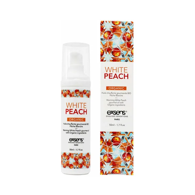white Exsens White Peach pump bottle beside orange-red fruit-patterned carton