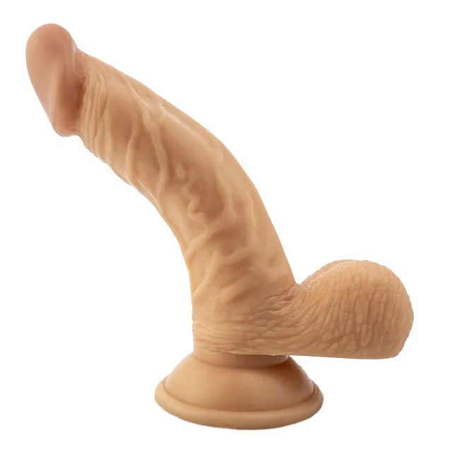 Front angle of beige curved dong with balls and suction base