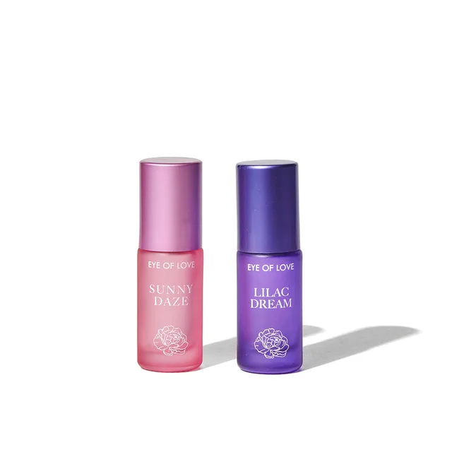 Pink and purple Eye of Love parfum roll-on duo