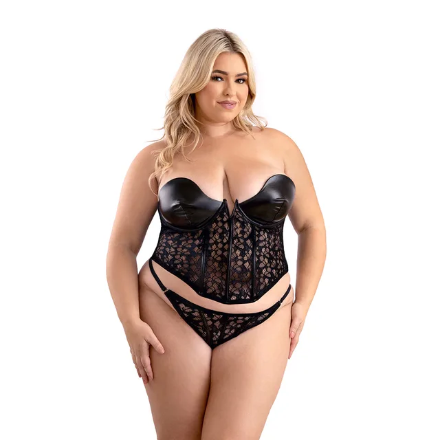 Plus-size model wearing black leather-look and floral lace underwire corset set