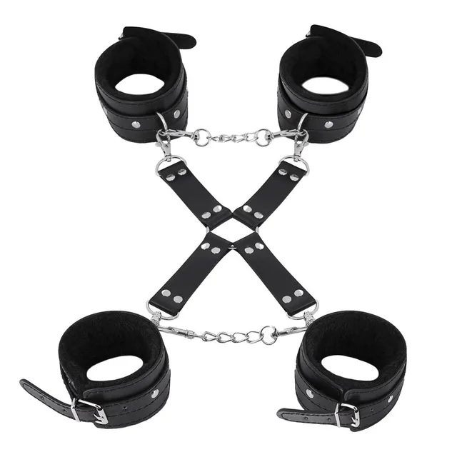 Front layout of four black cuffs crossed straps and chains