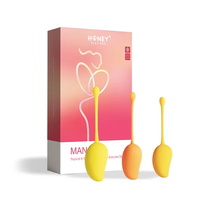 six yellow orange and pink Mango weighted Kegel balls beside gradient box