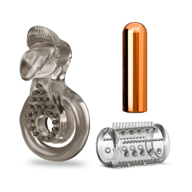 Blush Stay Hard vibrating ring set 5 components separated beside a copper-tone bullet